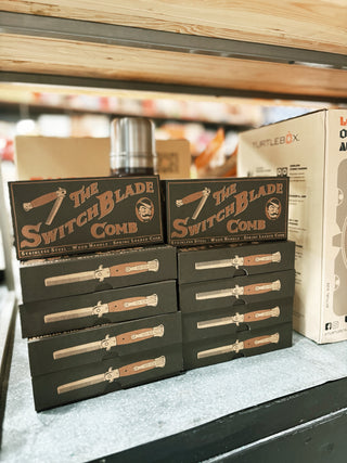 Genuine Switchblade Comb